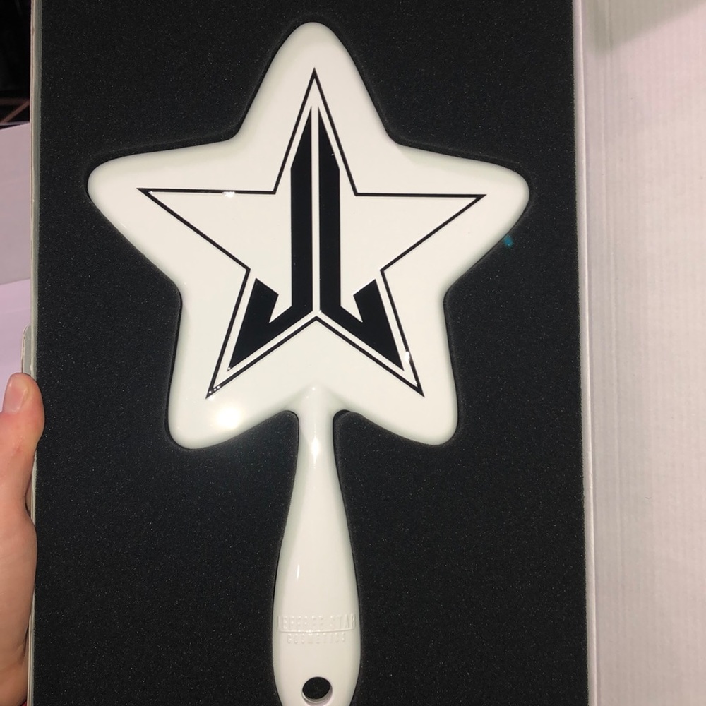 White Jeffree Star mirror